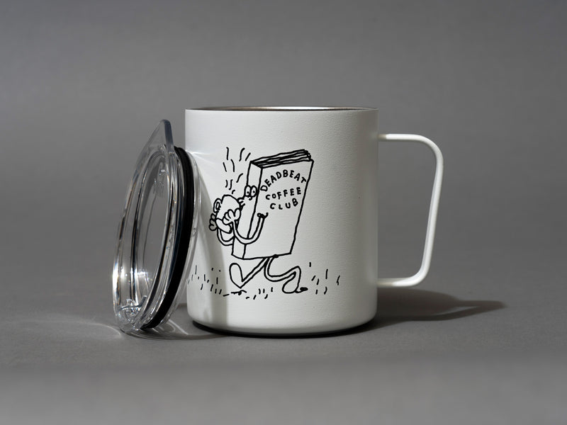 Close up, lid off, detail. Insulated coffee cups featuring wrap-around illustrations by artist Stefan Marx. A book drinking a cup of coffee and a coffee mug reading a book. "There's no money in books." "Deadbeat Club Coffee" "Deadbeat Club"
